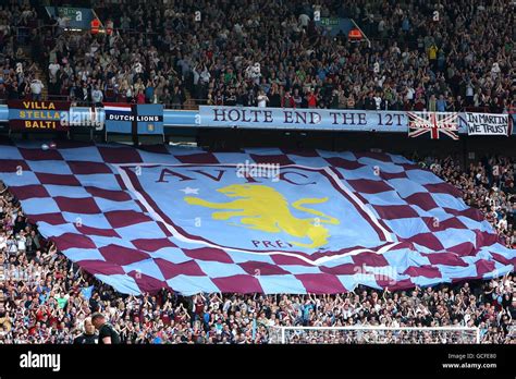 Aston villa fans in the holte end with giant flag hi-res stock ...