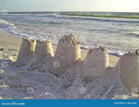 Sandcastles on beach stock photo. Image of vacation, sunset - 615016