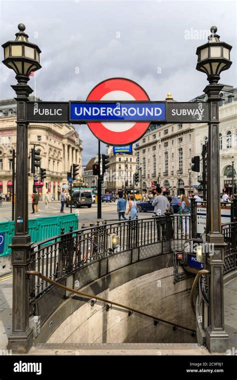 Piccadilly Circus, iconic Underground public subway and tube station sign, London, England, UK ...