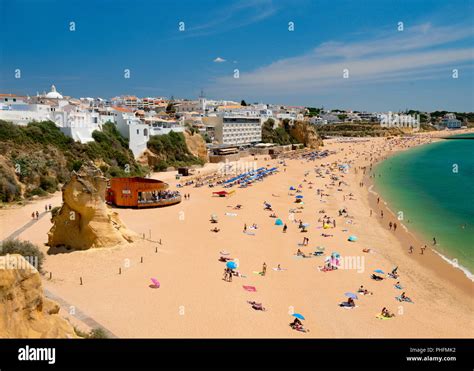 Albufeira beach and old town, with the Hotel Sol e Mar in summer Stock ...