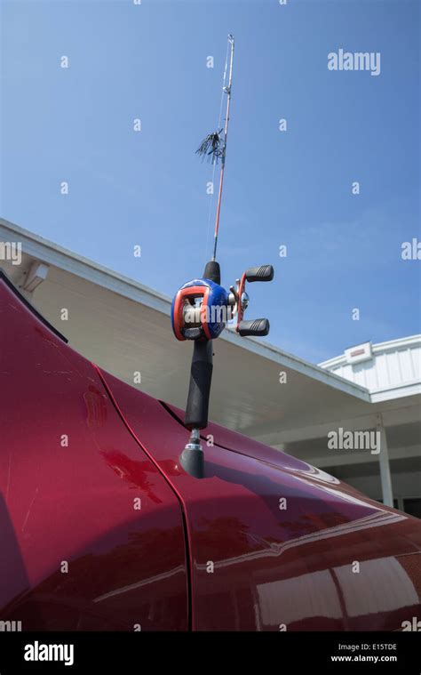 Fishing pole car antenna mounted on a pickup truck Stock Photo - Alamy