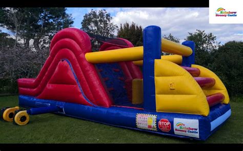 Rainbow Bouncy Castle - Bouncy Castle Rental For Birthdays