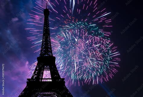 Celebratory colorful fireworks over the Eiffel Tower in Paris, France ...