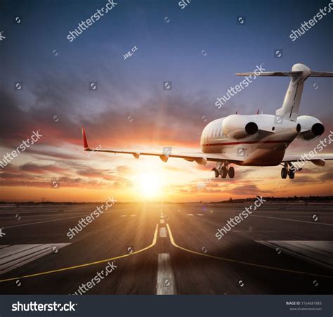 Private Jet Plane Landing On Runway Stock Photo 1164681883 | Shutterstock