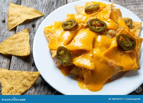 Mexican Nachos with Real Cheese and Jalapenos Pepper Stock Image ...