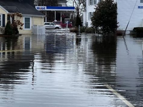 PHOTOS: Though Flood Waters In Downtown Mystic Receding, Caution Urged ...