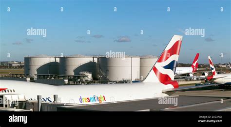 Aviation fuel tanks behind a Boeing 747 aircraft. Photographed at ...