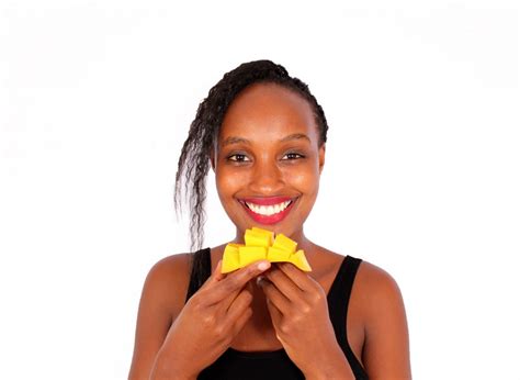 Smiling Woman Eating Sliced Mango - High Quality Free Stock Images