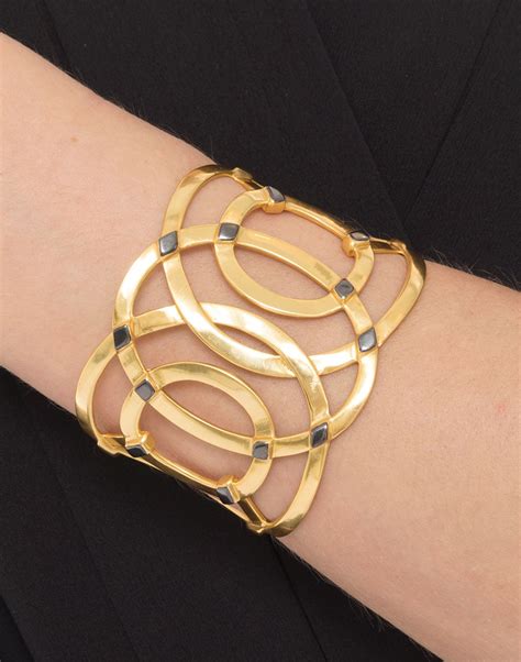 This stunning cuff bracelet by Julie Vos is as versatile as it is chic. Crafted from 24k gold ...