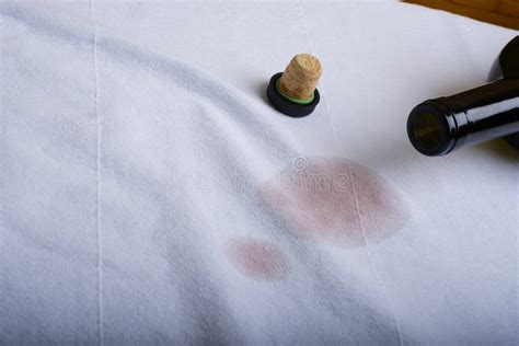 A stain of wine on clothes stock photo. Image of glass - 199205870