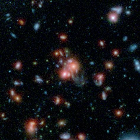 NewsCenter - NASA Telescopes Find Galaxy Cluster with Vibrant Heart (09/10/2015) - Release ...