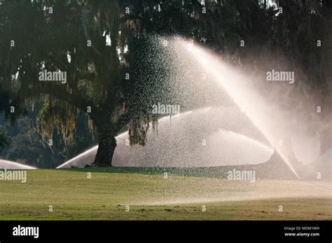 Golf course sprinklers hi-res stock photography and images - Alamy