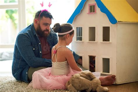 And Father of the Year Award Goes To.... Shot of an Adorable Little Girl and Her Father Playing ...