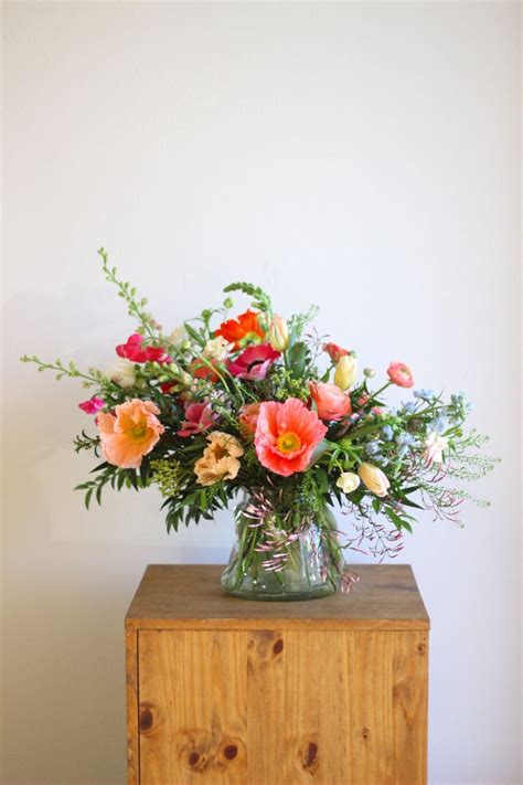 Wildflower Arrangement | Floral arrangements, Wedding table decorations, Wildflower centerpieces