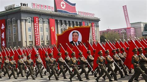 North Korea military parade combines missiles and pom-poms - BBC News