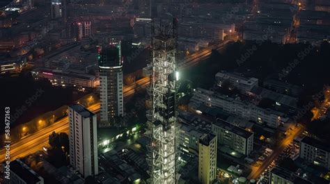 5G cell tower in the city between buildings, generative ai Stock ...