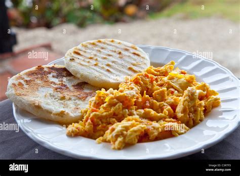 Breakfast, cheese arepas and eggs, Cartagena, Colombia Stock Photo - Alamy