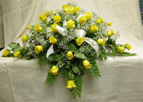 Yellow Roses Casket Spray by Flamingo's Flower