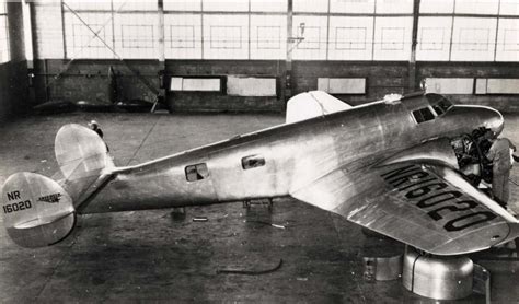 Amelia Earhart's Lockheed Electra plane in a Wheeler Field hangar being tuned for her attempted ...