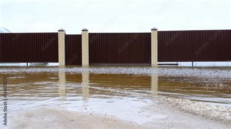 Spring flood in rural areas - flooding of the river, flooding of house ...