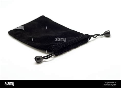 black small fabric pouch isolated on white background Stock Photo - Alamy