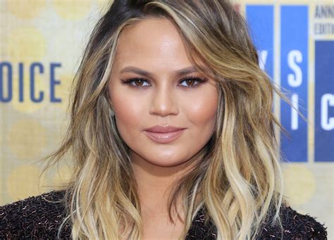 Chrissy Teigen Posts Breast Implant Removal Scars | RealSelf News