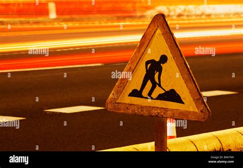 Men at work sign hi-res stock photography and images - Alamy