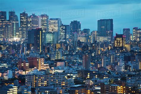 Downtown Tokyo skyline at dusk, Tokyo, Japan - Stock Photo - Dissolve