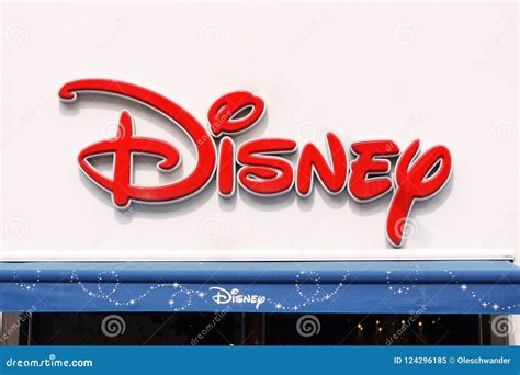 The Disney Logo On Sign Panel At The Exterior Of The Disney Store ...