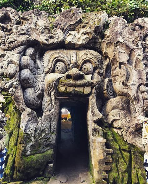 Goa Gajah (#elephant #cave #temple) the face carved into the rock is ...