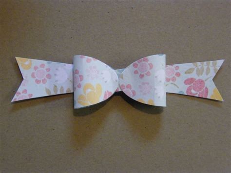 Paper Bow Tutorial - FYNES DESIGNS | Paper bow, Paper bows tutorial ...