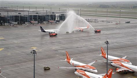 Berlin's much delayed new airport welcomes first flights