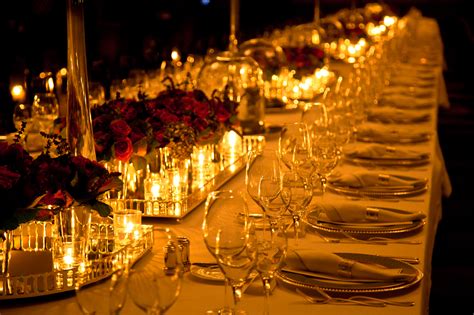 Elegant candlelight dinner table setting at reception by Cüneyd Demirci / 500px