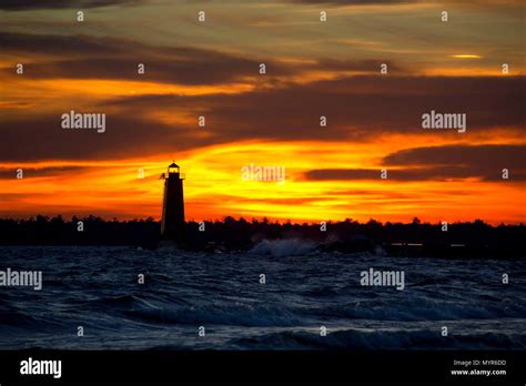 Manistique East Breakwater Lighthouse sunset, Lakeview Park, Manistique ...