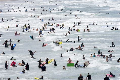 Holidaymakers turn Devon beach into piece of California as most of Britain basks in glorious ...