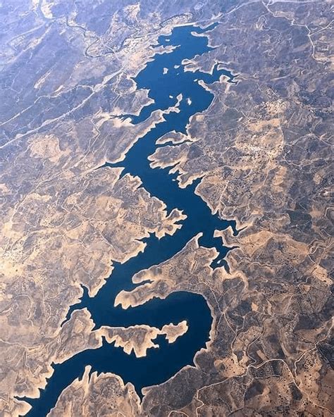 The Blue Dragon River in Portugal seen from the International Space Station : r/Snorkblot