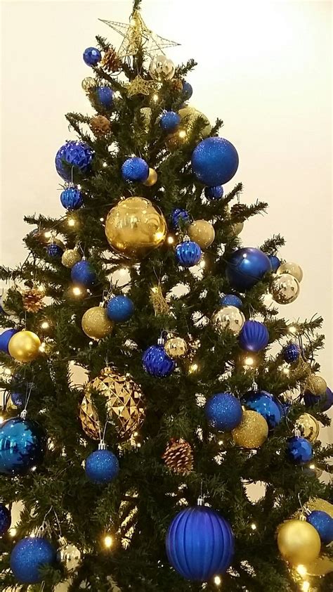 Blue and gold Christmas tree | Blue christmas tree decorations, Blue ...