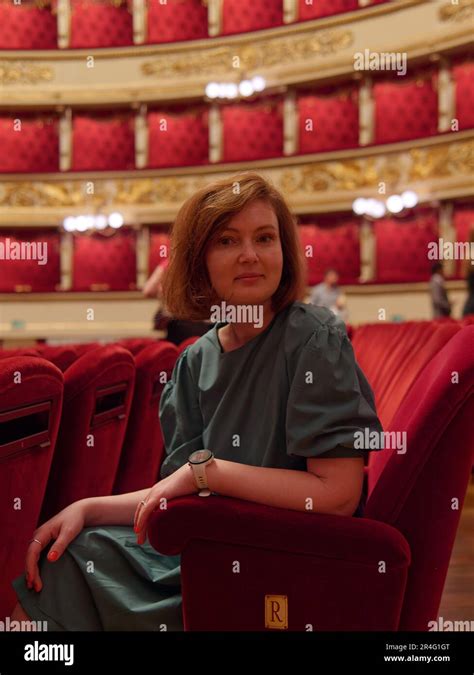 Pretyy lady in green outfit inside La Scala Opera House in Milan ...