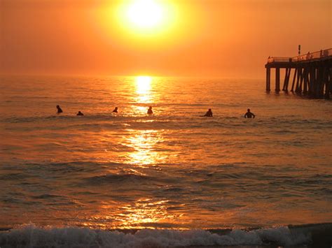 Hermosa Beach sunset surfing during Southern California wi… | Flickr