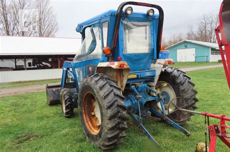 EquipmentFacts.com | ***** FORD 1920 4WD TRACTOR WITH LOADER AND FORKS Online Auctions