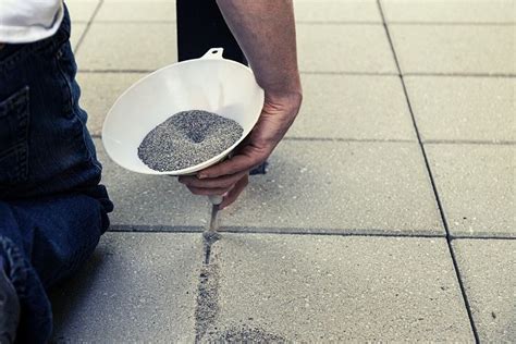 Polymeric Sand vs Regular Sand - What’s The Difference? - Driveway Expert