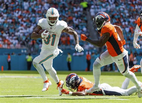 Dolphins Demolish Broncos 70-20; Achieving Highest NFL Game Score in 57 ...