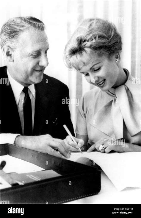 Attorney Sidney Korshak, left, signing Debbie Reynolds to a million ...