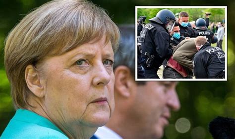 Angela Merkel heckled by furious German protesters during Bavaria meeting with Soder | World ...