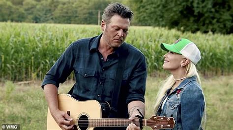 Gwen Stefani and Blake Shelton hug in Happy Anywhere video - ReadSector