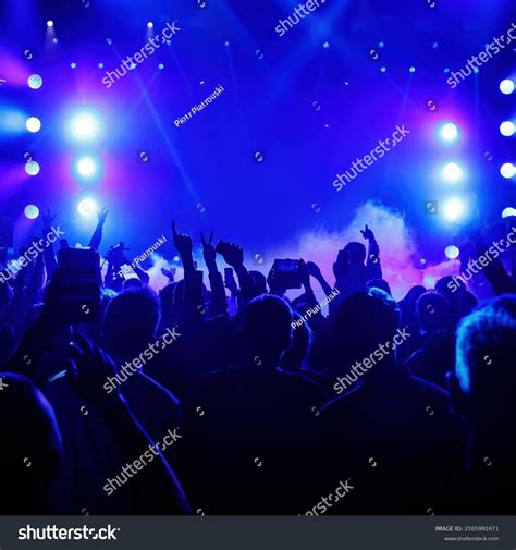 Happy Crowd Raised Hands Rock Concert Stock Photo 2165992471 | Shutterstock