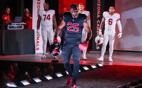 In downtown Phoenix, Arizona Cardinals unveil new uniforms ahead of NFL Draft