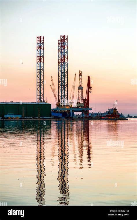 Industrial cargo cranes in the dock Stock Photo - Alamy