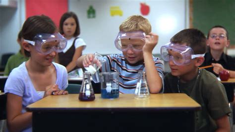 Elementary School Students Doing A Science Experiment Stock Footage ...