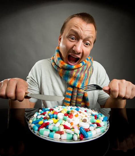 Man eating pills stock image. Image of nutritional, caucasian - 26560061